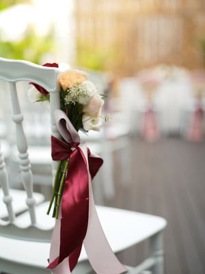 flower tied to a chair